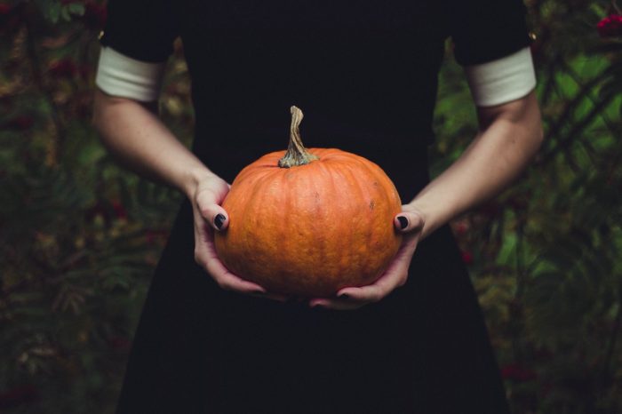 Woman with a pumpkin