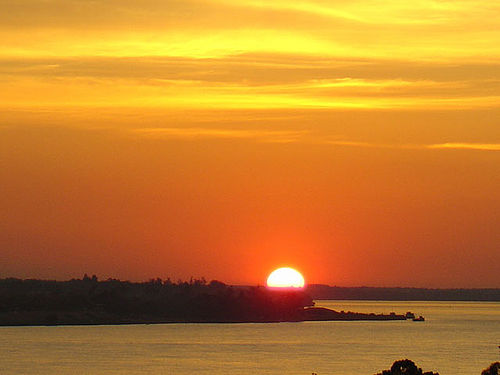 rising sun on the Paraná River