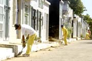 workers cleaning mausoleums